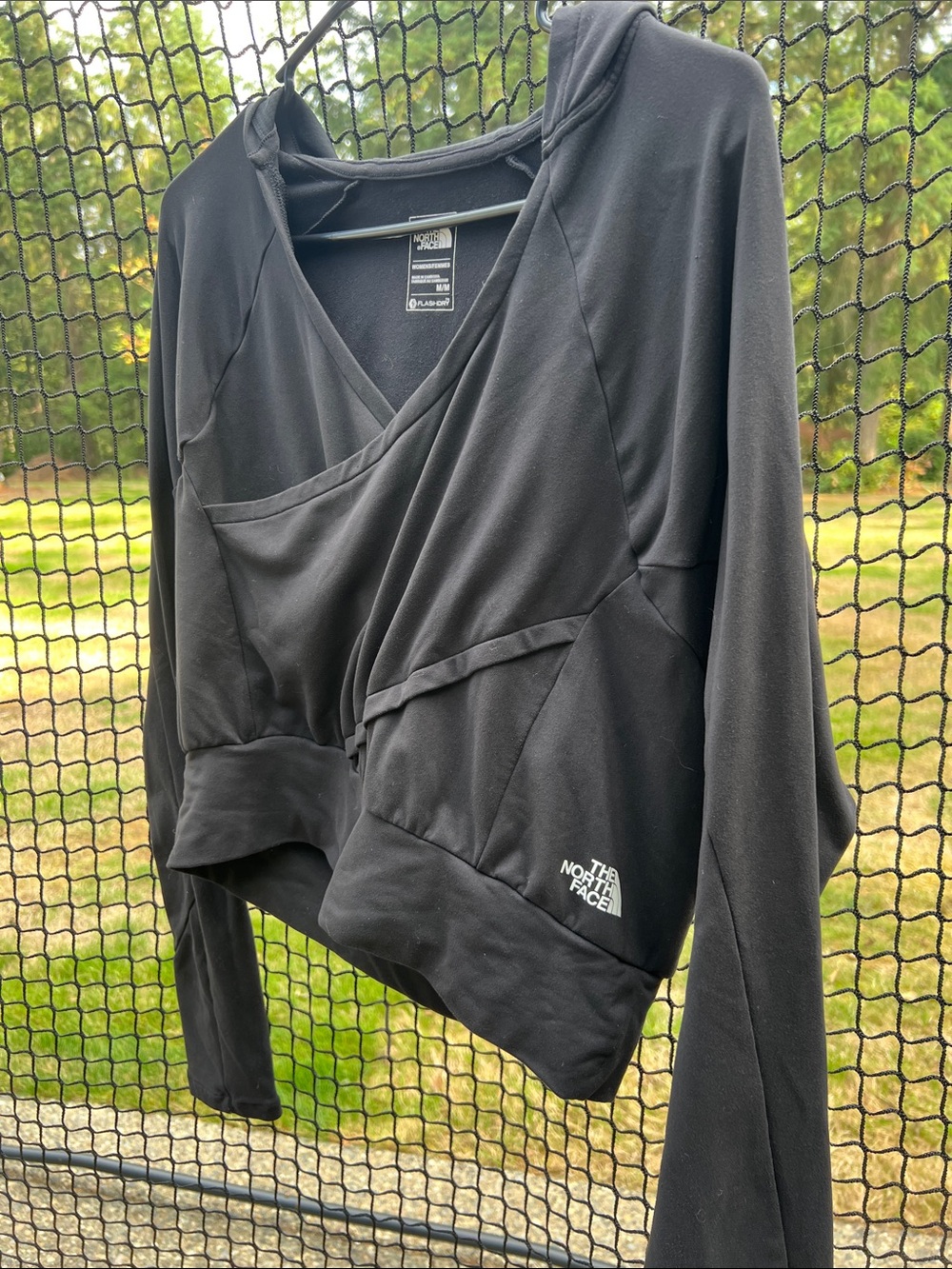 The North Face Black Crop Wrap Top (pink not included)
